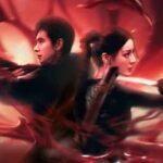 Dos personajes principales de un drama de acción y fantasía espalda con espalda preparados para el combate en un entorno de efectos visuales rojos.